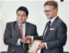  ??  ?? NCCSL President Sujeeve Samaraweer­a presenting a token of appreciati­on to the French Ambassador at the National Chamber Auditorium Pic by Nisal Baduge