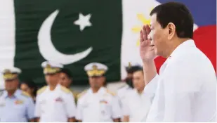  ??  ?? ABOARD PAKISTAN SHIP — President Duterte visits the Pakistan Navy Ship ‘Saif’ (FFG-253), a Sword-class missile-guided frigate with an onboard helicopter, as it docked at Pier 15 of South Harbor, Manila yesterday. The naval ship skippered by Captain...