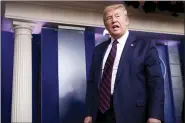  ?? ALEX BRANDON - THE AP ?? President Donald Trump leaves after speaking about the coronaviru­s in the James Brady Press Briefing Room, Friday, March 27, in Washington.