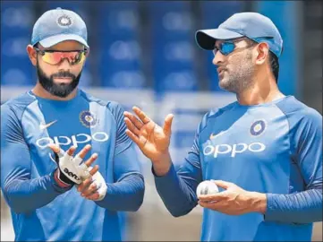  ?? AP ?? MS Dhoni (R) has won 27 out of 60 Tests as captain while Virat Kohli has already won 17 out of 27 Tests.