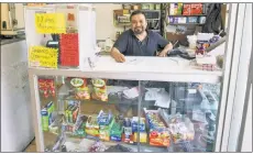  ??  ?? COUNTER OFFENSIVE: Ashwath Rajan (top left) and Paul McDonald are introducin­g the “Bodega” machine to compete with shops like Reveriano Flores’ Washington Heights bodega.