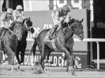  ?? DUBAI RACING CLUB ?? Country Grammer wins the $12 million Dubai World Cup on March 26. He got a rest during the spring and might make his comeback in the July 30 San Diego Handicap.