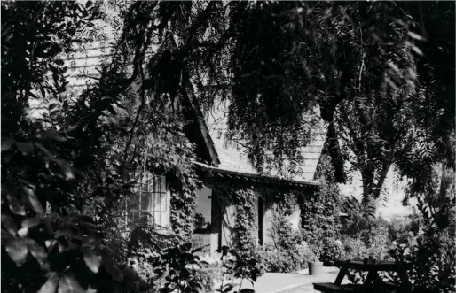  ??  ?? ABOVE AND BELOW: Two views of Whare Ra – the front of the house seen from the north east (above) and and the lower portal at the south-west corner (below).