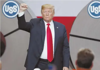  ?? AP PHOTO ?? HIS WAY: President Trump acknowledg­es the audience after speaking at the United States Steel Granite City Works plant in Granite City, Ill., Thursday. His tariffs are a break from past Republican presidents.