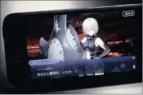  ??  ?? The
mobile game, produced by Sony’s Aniplex, Delightwor­ks and creative studio Type-Moon, is displayed on the App store on an Apple iPhone. The game’s success has given a much-needed boost to revenue.