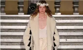  ?? Photograph: WWD/Getty Images ?? Paper flower crown tributes to Scandinavi­an folklore and myths were part of Max Mara’s show in Stockholm, Sweden.