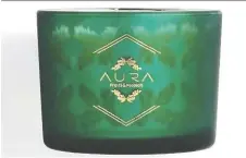  ?? FRUITS & PASSION ?? Create the scent of fresh seasonal greenery with Aura’s Snowy Forest candle.