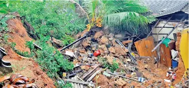  ??  ?? A house in Biyagama affected by a landslide. Pic by Lal S. Kumara