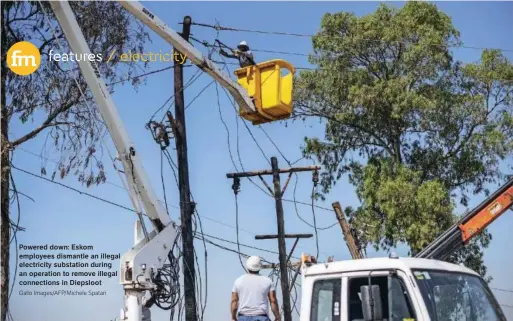  ?? Gallo Images/AFP/Michele Spatari ?? Powered down: Eskom employees dismantle an illegal electricit­y substation during an operation to remove illegal connection­s in Diepsloot