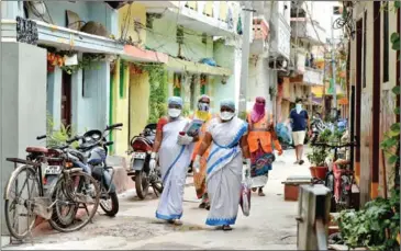  ?? AFP ?? Accredited social health activists (Ashas) often face discrimina­tion while testing citizens for coronaviru­s.