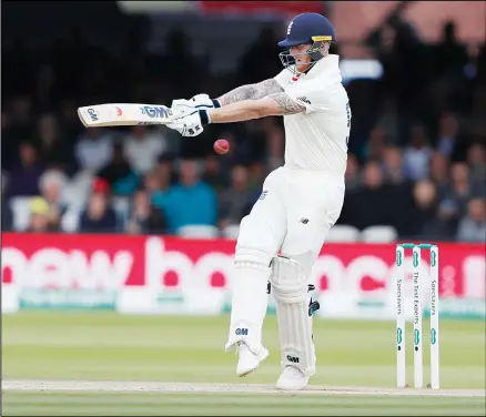  ??  ?? England’s Ben Stokes attempts to play a shot off the bowling of Australia’s Pat Cummins during play on day five of the 2nd Ashes Test cricket match
between England and Australia at Lord’s cricket ground in London on Aug 18. (AP)