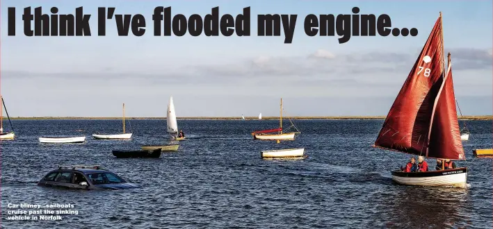 ?? Pictures: SWNS ?? Car blimey... sailboats cruise past the sinking vehicle in Norfolk