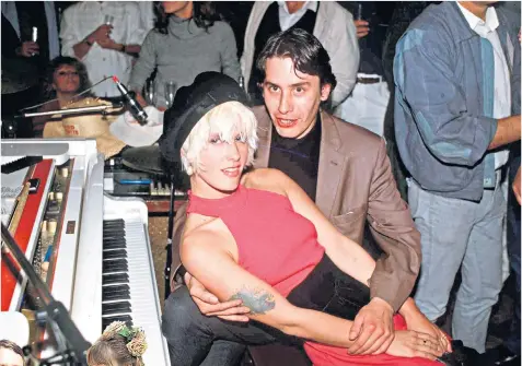  ??  ?? Jools Holland and Paula Yates, above, in 1984. Far left, Jools with his wife, Christabel at their wedding in 2005, and left, Cooling Castle, the home of the Holland family. Top right, Cooling Castle Barn set up for a wedding