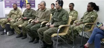  ?? — AFP photos ?? Foreign soldiers made prisoners of war (POW) after being captured by Ukraine as comba ants within the Russian armed forces, take part in a press conference organised by Ukrainian officials in Kyiv.