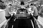  ?? REUTERS ?? Traditiona­l car manufactur­ers, in Britain and in Europe over all, have been buffeted by forces around the world