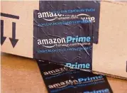  ?? Ross D. Franklin / Associated Press file ?? Amazon.com increased the price for its Prime service by 25 percent in 2014, but that hasn’t curbed enthusiasm for the program.