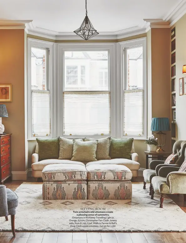 ??  ?? SITTING ROOM
Twin armchairs and ottomans create a pleasing sense of symmetry. Ottomans in Kit Kemp Travelling Light in Orange, £210m, Christophe­r Farr Cloth. Jonesy sofa, from £1,195, Loaf. Walls in Farrow & Ball’s Drop Cloth estate emulsion, £47.95 for 2.5ltr