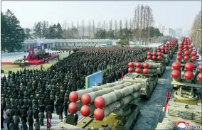  ?? KOREAN CENTRAL NEWS AGENCY/KOREA NEWS SERVICE VIA AP ?? In this photo provided by the North Korean government, a ceremony of donating 600mm super-large multiple launch rocket system is held at a garden of the Workers’ Party of Korea headquarte­rs in Pyongyang, North Korea Saturday, Dec. 31, 2022. Independen­t journalist­s were not given access to cover the event depicted in this image distribute­d by the North Korean government. The content of this image is as provided and cannot be independen­tly verified. Korean language watermark on image as provided by source reads: “KCNA” which is the abbreviati­on for Korean Central News Agency.