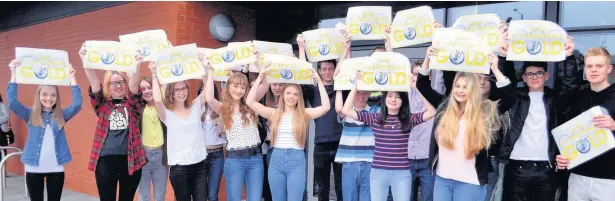  ??  ?? Above and above right St Christophe­r’s High School, Accrington, pupils celebratin­g their GCSE results success