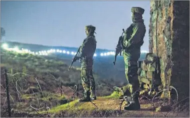  ?? GURINDER OSAN/HT FILE PHOTO ?? Soldiers guard the forward posts in Hamirpur area near Bhimber Gali, close to where Wednesday’s strikes took place.