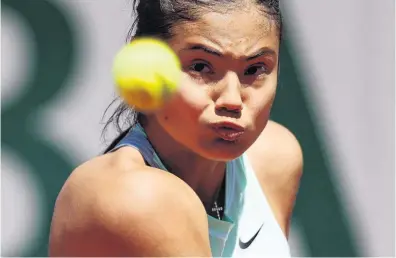  ?? PHOTO: REUTERS ?? Facing defeat . . . Britain's Emma Raducanu lines up a backhand during her French Open second round loss to Belarus' Aliaksandr­a Sasnovich at Roland Garros in Paris yesterday.