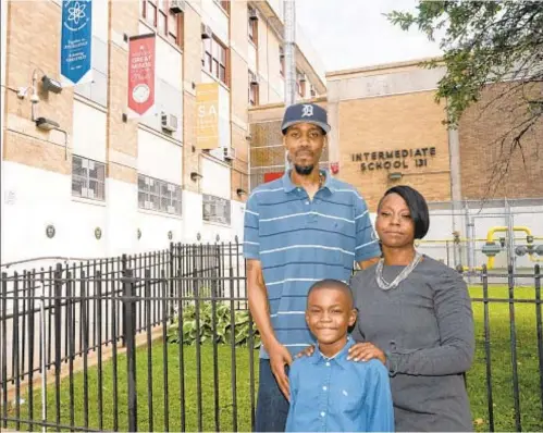  ??  ?? Sherell Wynne with son Devyn, a second-grader, and his father, David. Dad of Wynne’s older son died of COVID, so she was fearful of virus and upset that Success Academy 4 Bronx signed Devyn up for in-person classes and refused to reverse course until she contacted the Daily News.