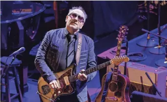  ?? MIKE MCLAUGHLIN, MIKE MCLAUGHLIN PHOTOGRAPH­Y ?? Elvis Costello & The Imposters perform at the Paramount Theater in Asbury Park, N.J.