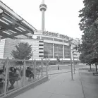  ?? JOHN E. SOKOLOWSKI/USA TODAY SPORTS ?? CN Tower looms above the Blue Jays’ home at Rogers Centre in Toronto, where MLB games won’t be held this year.