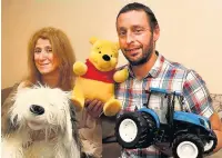  ??  ?? Kathleen and Glyn Rowley pictured last year with just some of the 1,500 toys they collected