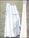  ?? ?? This piece of corrugated iron sheet remains a hazard to people and animals walking and grazing next to the strucTURE.