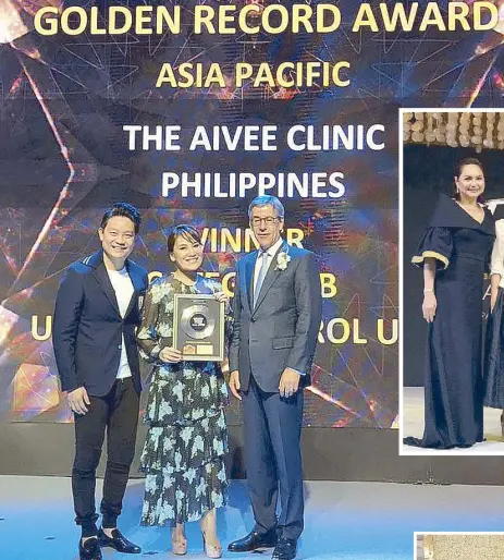  ??  ?? Dr. Aivee Aguilar-Teo (center) and Dr. Z Teo receive the Merz Golden Record Award 2018 for The Aivee Group with Merz CEO Philip Burchard at the Athenee Hotel, Bangkok.