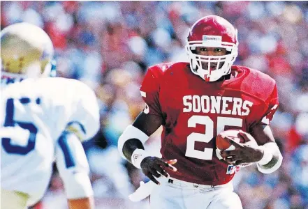  ?? [DOUG HOKE/ THE OKLAHOMAN] ?? Former Sooners running back James Allen, pictured in a 1993 game against Tulsa, is now in the marijuana business. After a career in the NFL, Allen recently opened Crimson Greenery dispensary in Ardmore.
