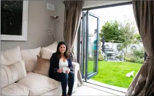  ??  ?? TV3 personalit­y Lisa Cannon who is extremely happy with her new Weathergla­ze bi-fold door.
