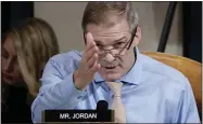  ?? SHAWN THEW — THE ASSOCIATED PRESS ?? Rep. Jim Jordan, R-Ohio, questions Vindman and Jennifer Williams, a national security aide to Vice President Mike Pence, as they testify before the House panel.
