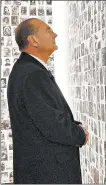  ?? JACQUES BRINON/AP 1995 ?? Jacques Chirac looks at photos of Jews sent to Nazi death camps during a Holocaust memorial dedication in Paris.