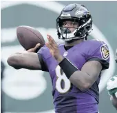  ?? BRAD PENNER AP ?? The Ravens and quarterbac­k Lamar Jackson are shelving further contract talks until the offseason.