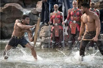  ?? Matt Kennedy, Marvel Studios-Walt Disney ?? Chadwick Boseman, left, and Michael B. Jordan face off in the 2018 film “Black Panther.”