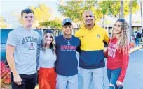  ?? COURTESY ?? Jason Taylor, second from right, with son, Isaiah, center, daughter Zoe, right, son Mason , far left and wife Monica, after Isaiah signed his National Letter of Intent to play football at Arizona.