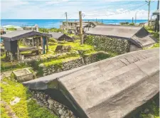  ?? GETTY IMAGES ?? A traditiona­l undergroun­d Tao home is pictured on Orchid Island. The Yami people are calling for limits to be imposed on tourists.