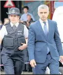  ??  ?? Dignified: Metropolit­an Police Commission­er Cressida Dick and Mayor of London Sadiq Khan visit the scene near London Bridge