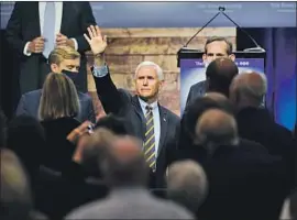  ?? VICE PRESIDENT Charlie Neibergall Associated Press ?? Mike Pence waves to supporters in Des Moines. A recent poll shows even support for President Trump and Joe Biden in the swing state of Iowa.