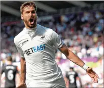  ??  ?? Target man: Swansea’s Fernando Llorente is wanted by both Tottenham and Chelsea