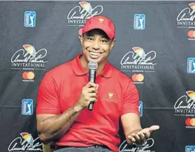  ?? FOTO: AP ?? Ha recuperado la sonrisa Tiger Woods, en la rueda de prensa que dio en el Bay Hill