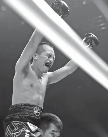 ?? ASSOCIATED PRESS ?? Philippine interim champion Milan Melindo after defeating Japanese champion Akira Yaegashi in the first round of their IBF light flyweight boxing unified champion match in Toky. Melindo knocked out Yaegashi in the first round to win the title.