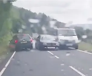  ??  ?? The moment care worker Coleen Coombs was forced to swerve out of the way to avoid a car overtaking on the Rhigos Mountain in Rhondda Cynon Taff