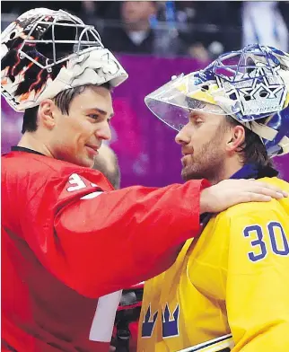  ?? JEAN LEVAC/POSTMEDIA NEWS FILES ?? Habs’ Carey Price is congratula­ted by Henrik Lundqvist of Sweden after Canada’s gold medal win at the Sochi Olympics. The world’s two best goalies meet again on Wednesday.