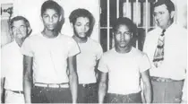  ?? FILE PHOTO ?? This iconic picture depicts three of the “Groveland Four,” along with the late Sheriff Willis McCall and a jailer. Florida’s Clemency Board on Friday granted pardons to the men whose lives were ruined by a racist criminal justice system.