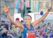  ?? AFP ?? Joyciline Jepkosgei holds the half marathon world record.