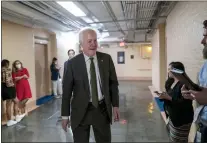  ?? J. SCOTT APPLEWHITE — THE ASSOCIATED PRESS ?? Sen. John Cornyn, R-Texas, arrives to meet with Sen. Chris Murphy, D-Conn., and Sen. Kyrsten Sinema, D-Ariz., arrive for more bipartisan talks on how to rein in gun violence, at the Capitol in Washington, Wednesday, June 15, 2022. Democratic and Republican negotiator­s have already reached a broad agreement but still need to convert that accord into legislatio­n, in hopes that Congress could approve it before leaving for its July 4recess.