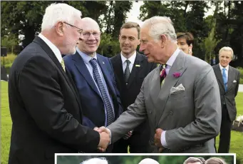  ?? Photo by Michelle Cooper Galvin ?? TOP: The historic handshake between former IRA volunteer Martin Ferris and Britain’s Prince Charles.
RIGHT: Deputies Martin Ferris and John Brassil with Sen. Mark Daly at the visit by Charles Prince of Wales and Camilla Duchess of Cornwall to...